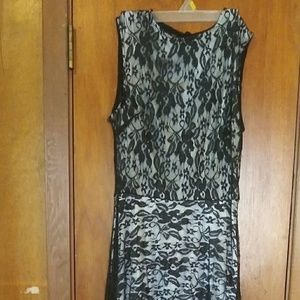 +Black with sheet overlay. Long lace train.